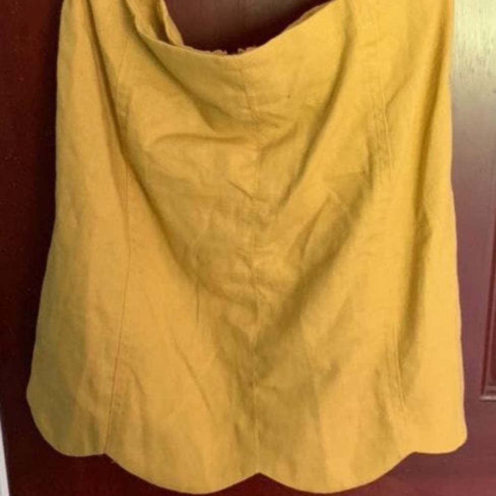 tight yellow mini skirt